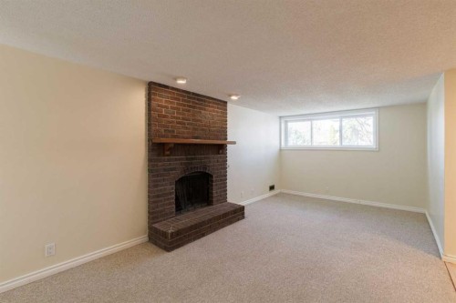 48 Ranchridge Drive Nw, Calgary, AB - Indoor With Fireplace