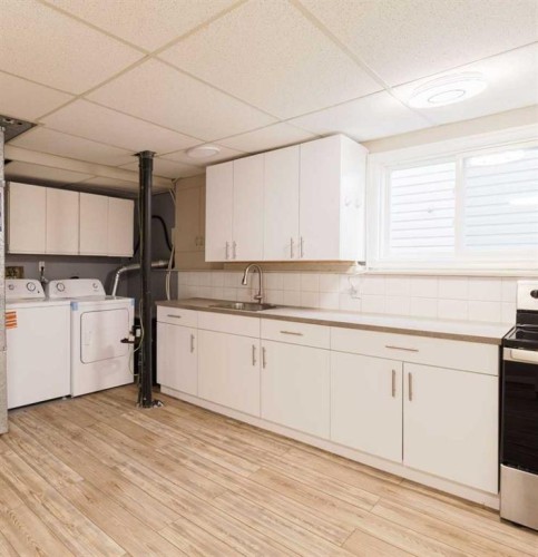 48 Ranchridge Drive Nw, Calgary, AB - Indoor Photo Showing Laundry Room