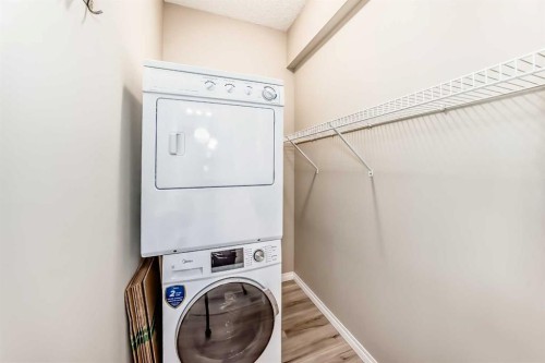 78 Kincora Heath Nw, Calgary, AB - Indoor Photo Showing Laundry Room