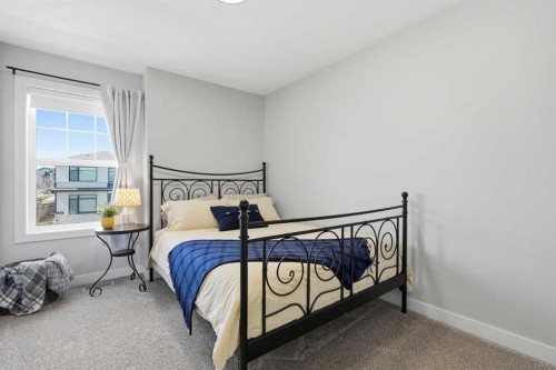 120 Treeline Manor Sw, Calgary, AB - Indoor Photo Showing Bedroom