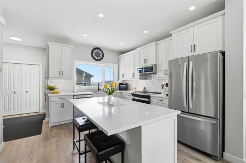 120 Treeline Manor Sw, Calgary, AB - Indoor Photo Showing Kitchen With Stainless Steel Kitchen With Upgraded Kitchen