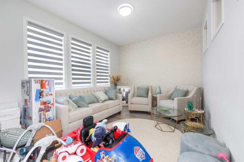 31 Cornerbrook Avenue Ne, Calgary, AB - Indoor Photo Showing Living Room