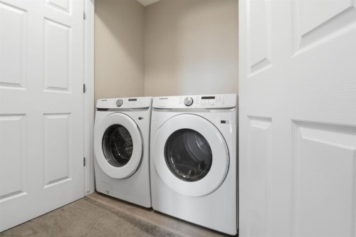 93 Cityline Square Ne, Calgary, AB - Indoor Photo Showing Laundry Room