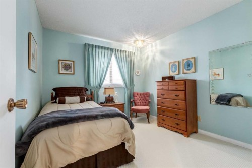 107 Valhalla Crescent Nw, Calgary, AB - Indoor Photo Showing Bedroom