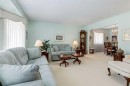 107 Valhalla Crescent Nw, Calgary, AB  - Indoor Photo Showing Living Room 