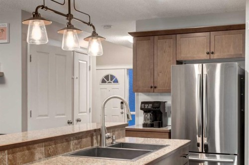 436 Cranberry Circle Se, Calgary, AB - Indoor Photo Showing Kitchen With Double Sink