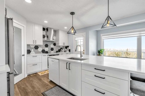 215 Edgevalley Mews, Calgary, AB - Indoor Photo Showing Kitchen With Upgraded Kitchen