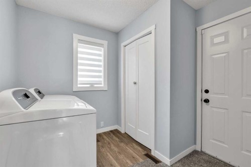 215 Edgevalley Mews, Calgary, AB - Indoor Photo Showing Laundry Room