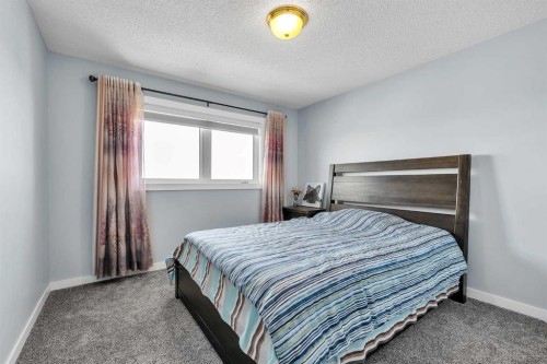 215 Edgevalley Mews, Calgary, AB - Indoor Photo Showing Bedroom