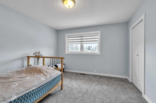215 Edgevalley Mews, Calgary, AB - Indoor Photo Showing Bedroom
