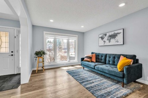 215 Edgevalley Mews, Calgary, AB - Indoor Photo Showing Living Room