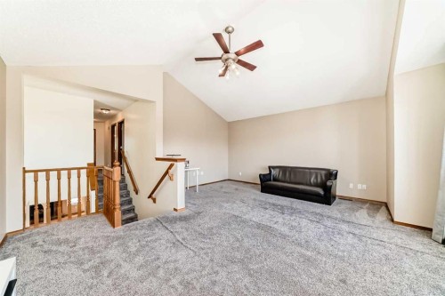 84 Cougarstone Square Sw, Calgary, AB - Indoor Photo Showing Other Room