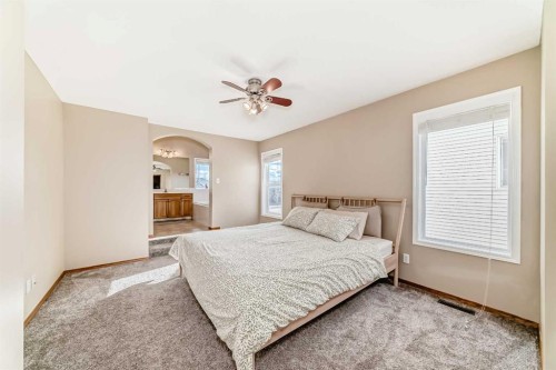 84 Cougarstone Square Sw, Calgary, AB - Indoor Photo Showing Bedroom