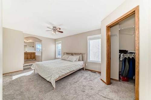 84 Cougarstone Square Sw, Calgary, AB - Indoor Photo Showing Bedroom