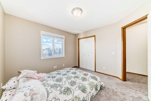 84 Cougarstone Square Sw, Calgary, AB - Indoor Photo Showing Bedroom