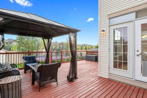 84 Cougarstone Square Sw, Calgary, AB - Outdoor With Deck Patio Veranda With Exterior