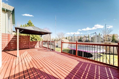 84 Cougarstone Square Sw, Calgary, AB - Outdoor With Deck Patio Veranda With Exterior