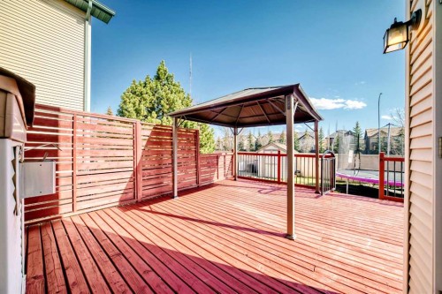 84 Cougarstone Square Sw, Calgary, AB - Outdoor With Deck Patio Veranda With Exterior