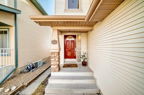 84 Cougarstone Square Sw, Calgary, AB - Outdoor With Exterior