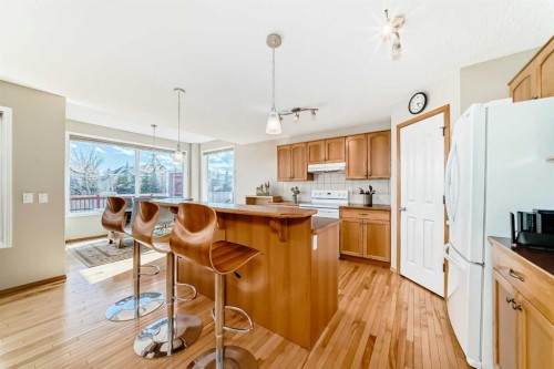 84 Cougarstone Square Sw, Calgary, AB - Indoor Photo Showing Kitchen