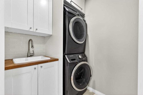 95 Crestmont Drive Sw, Calgary, AB - Indoor Photo Showing Laundry Room