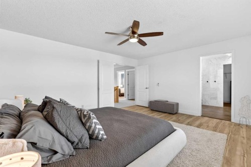 95 Crestmont Drive Sw, Calgary, AB - Indoor Photo Showing Bedroom