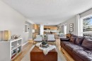 95 Crestmont Drive Sw, Calgary, AB  - Indoor Photo Showing Living Room 