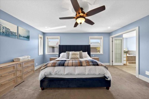 917 Channelside Road Sw, Airdrie, AB - Indoor Photo Showing Bedroom