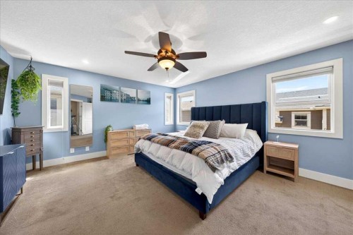 917 Channelside Road Sw, Airdrie, AB - Indoor Photo Showing Bedroom