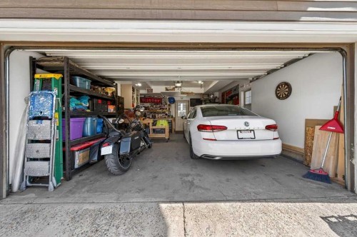 917 Channelside Road Sw, Airdrie, AB - Indoor Photo Showing Garage