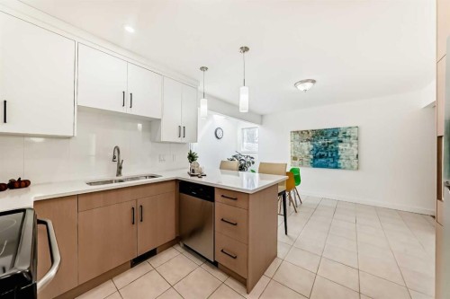 451 Huntbourne Hill Ne, Calgary, AB - Indoor Photo Showing Kitchen With Double Sink