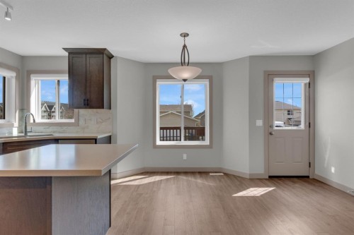 19 Bridleglen Road Sw, Calgary, AB - Indoor Photo Showing Kitchen With Double Sink