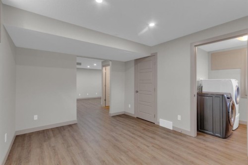 19 Bridleglen Road Sw, Calgary, AB - Indoor Photo Showing Laundry Room