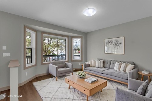 19 Bridleglen Road Sw, Calgary, AB - Indoor Photo Showing Living Room