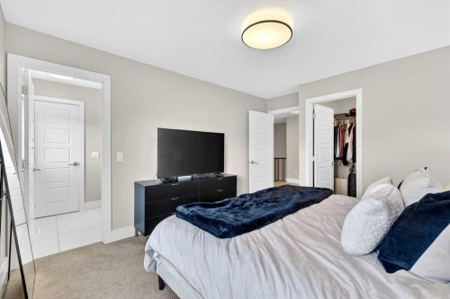 548 Quarry Park Boulevard Se, Calgary, AB - Indoor Photo Showing Bedroom