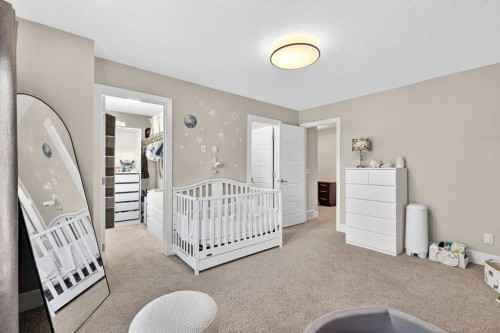 548 Quarry Park Boulevard Se, Calgary, AB - Indoor Photo Showing Bedroom