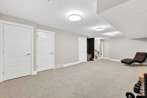 548 Quarry Park Boulevard Se, Calgary, AB - Indoor Photo Showing Other Room