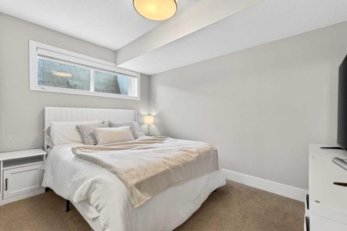 548 Quarry Park Boulevard Se, Calgary, AB - Indoor Photo Showing Bedroom