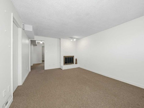 11759 Canfield Road Sw, Calgary, AB - Indoor Photo Showing Other Room