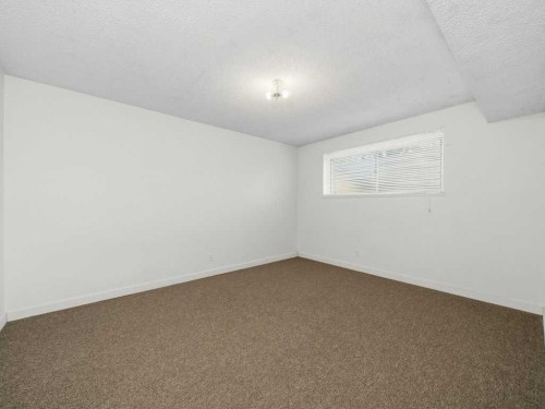 11759 Canfield Road Sw, Calgary, AB - Indoor Photo Showing Other Room
