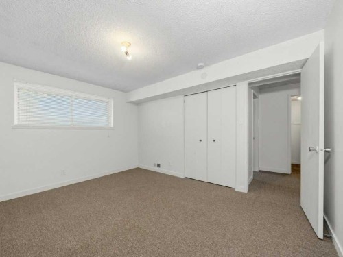 11759 Canfield Road Sw, Calgary, AB - Indoor Photo Showing Other Room