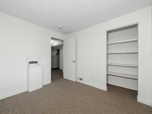 11759 Canfield Road Sw, Calgary, AB - Indoor Photo Showing Other Room