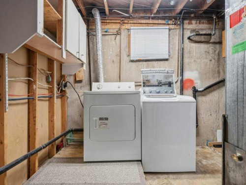 11759 Canfield Road Sw, Calgary, AB - Indoor Photo Showing Laundry Room