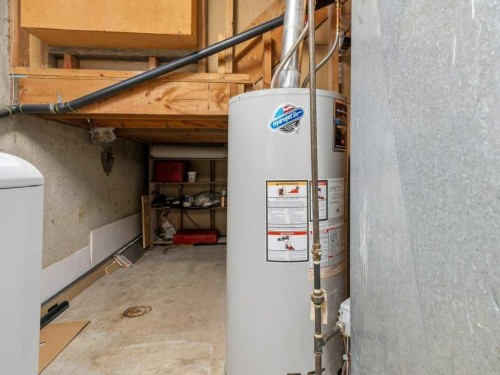 11759 Canfield Road Sw, Calgary, AB - Indoor Photo Showing Basement