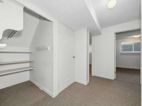 11759 Canfield Road Sw, Calgary, AB - Indoor Photo Showing Other Room