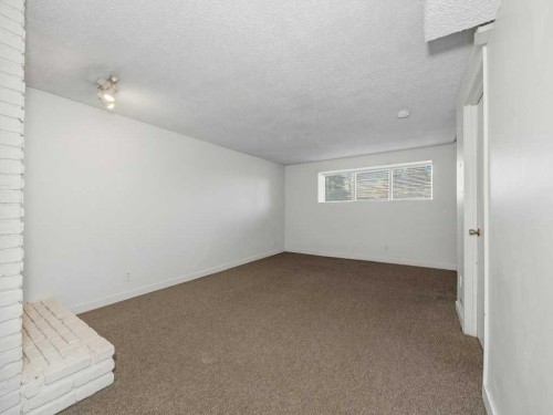 11759 Canfield Road Sw, Calgary, AB - Indoor Photo Showing Other Room