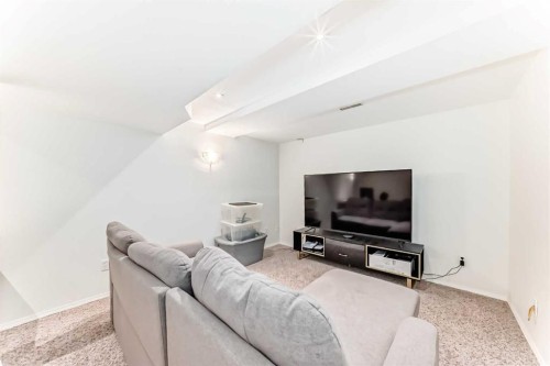 209 Somervale Point Sw, Calgary, AB - Indoor Photo Showing Living Room