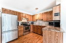 209 Somervale Point Sw, Calgary, AB  - Indoor Photo Showing Kitchen With Double Sink 