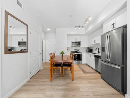 3111-3727 Sage Hill, Calgary, AB - Indoor Photo Showing Kitchen With Stainless Steel Kitchen