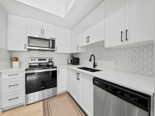 3111-3727 Sage Hill, Calgary, AB - Indoor Photo Showing Kitchen With Stainless Steel Kitchen With Double Sink With Upgraded Kitchen